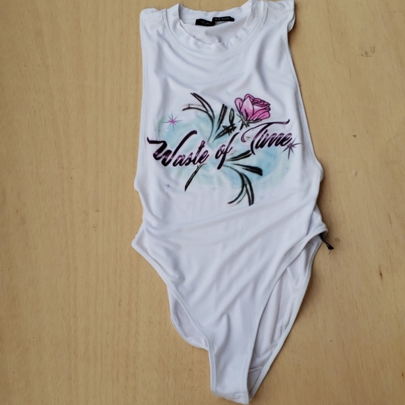 Urban Outfitters Tops - Out from under waste of time body suit NWOT